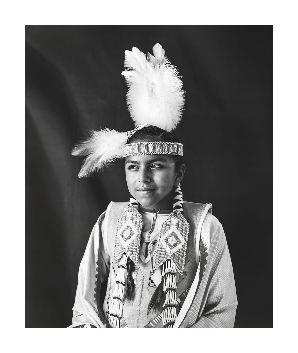 american-indian-girl-feather-portrait