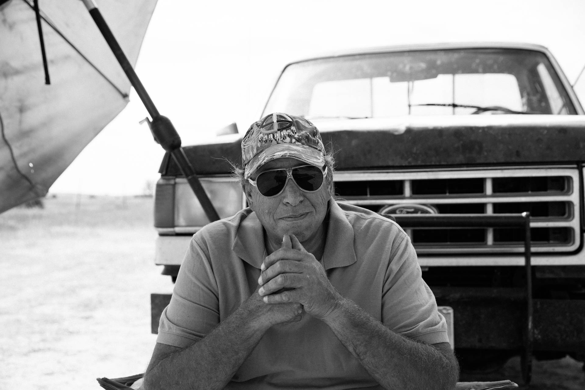 pine-ridge-reservation-donnie-portrait-badlands-overlook-ford-truck-travis-dewitz-9063.JPG