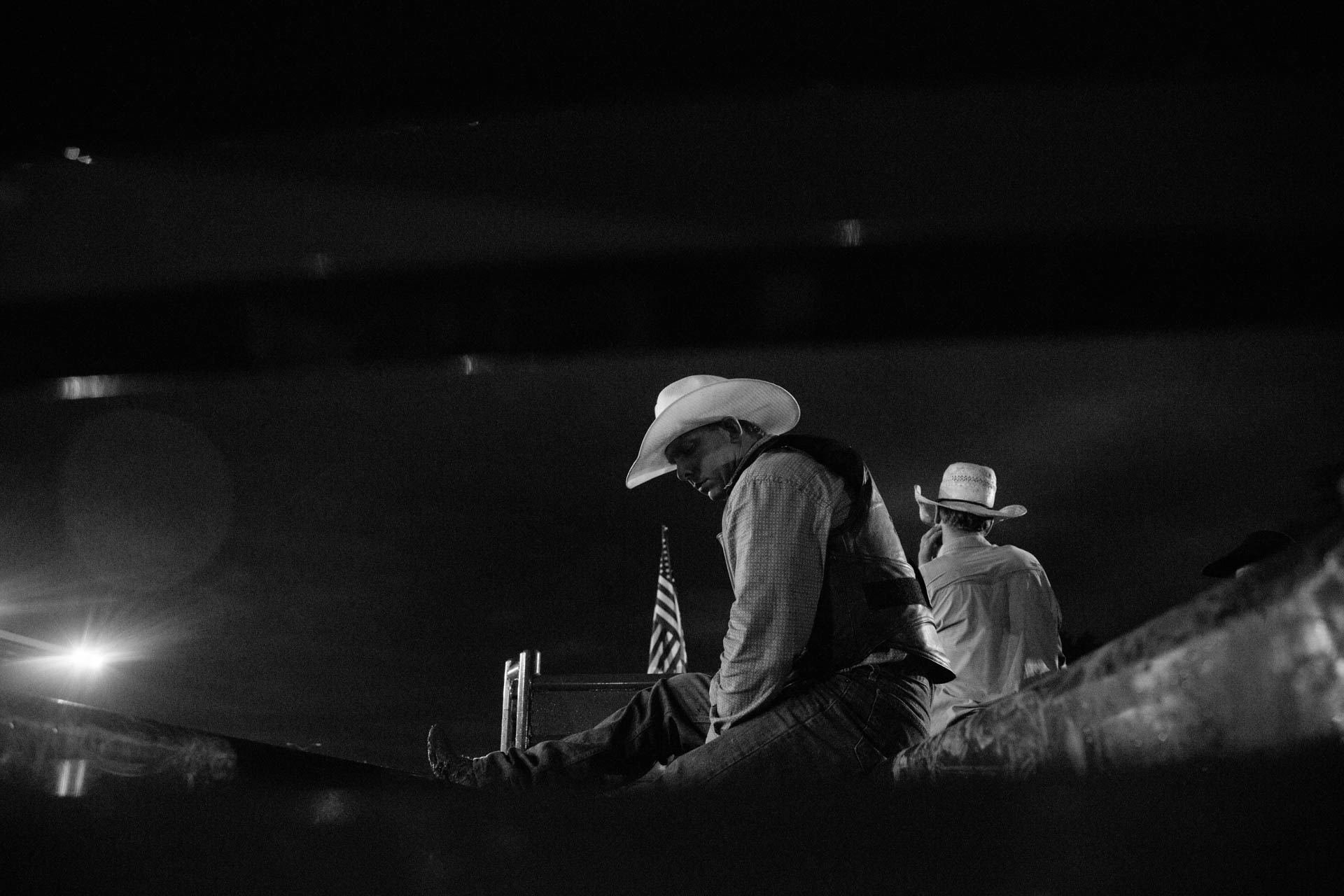 rough-nite-at-the-rodeo-sitting-on-chutes-a5291